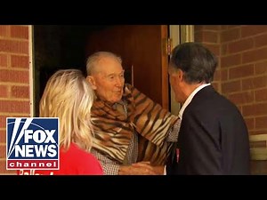 Mitt Romney goes door-to-door as he canvasses Salt Lake City