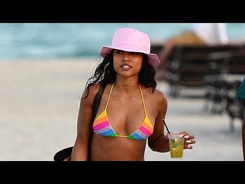 Karrueche Tran Flaunts Killer Curves In Rainbow Bikini While Hitting Up The Beach In Miami – Pics -