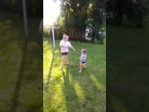 4 year old girl walking with the ducks