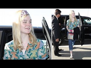 Elle Fanning Smiles For Fans At LAX