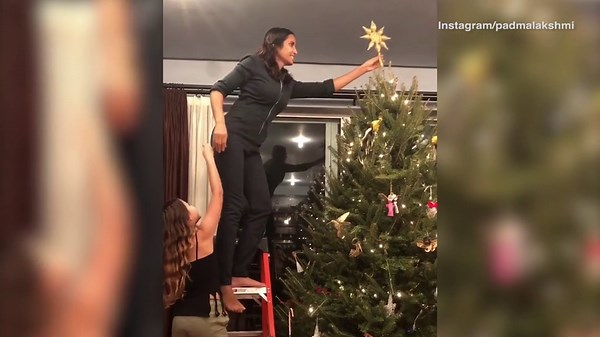 Padma Lakshmi puts star on Christmas tree with daughter help