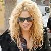 Shakira wows in sleek leather jacket and stiletto boots as she steps out in Barcelona