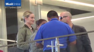 Rosie Huntington-Whiteley playfully sticks tongue out at LAX | Daily Mail Online