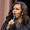 Michelle Obama turns heads with shimmering $3,900 boots, talks fashion with Sarah Jessica Parker