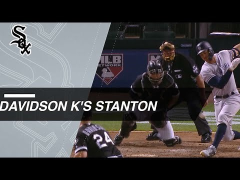 Infielder Matt Davidson strikes out Giancarlo Stanton