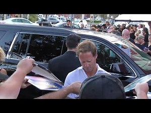 Nat Faxon signs for fans outside the screening of Netflix’s Disenchantment at Vista Theatre in Los A