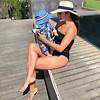 Eva Longoria shows off her fantastic figure during pool day with baby Santiago