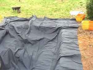 part 4-the butyl pond liner is rolled out