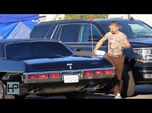 Shia LaBeouf Shirtless and Tatted up While Cleaning Car in Between Takes of "The Tax Collector"